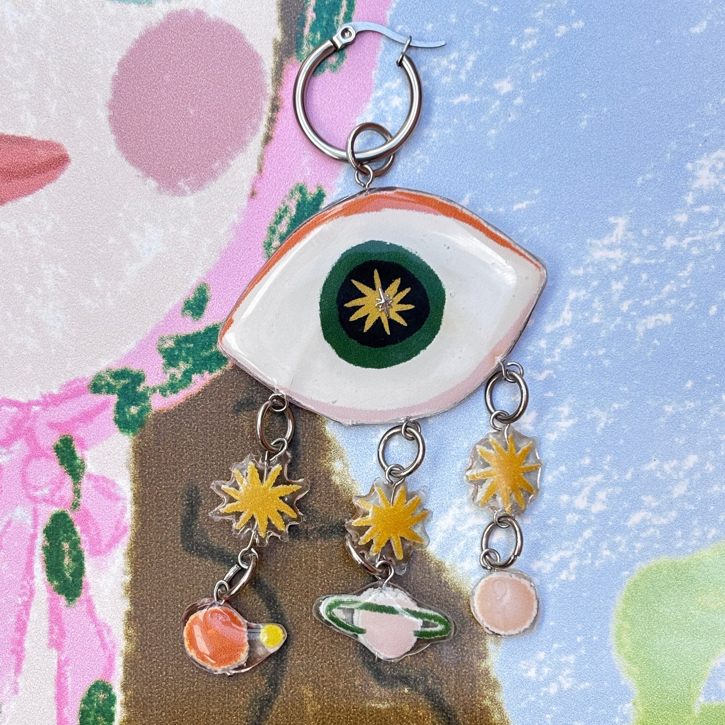 Par de aretes sistema solar ojos