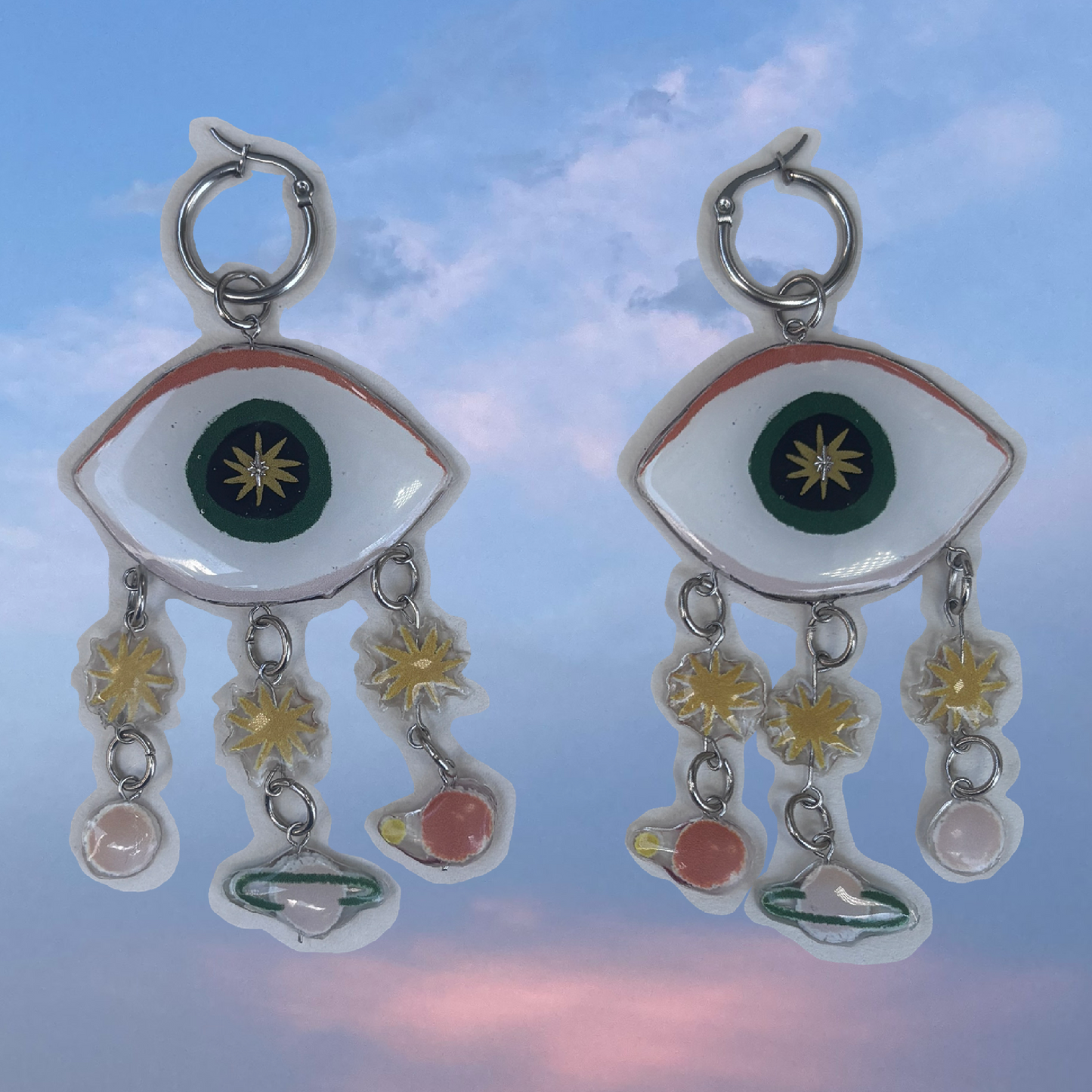 Par de aretes sistema solar ojos