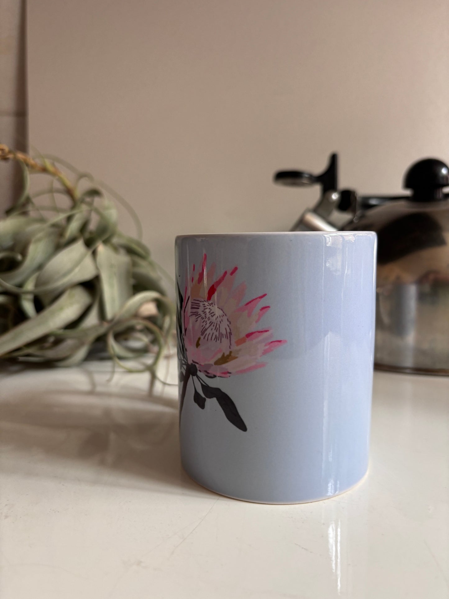 Taza Protea