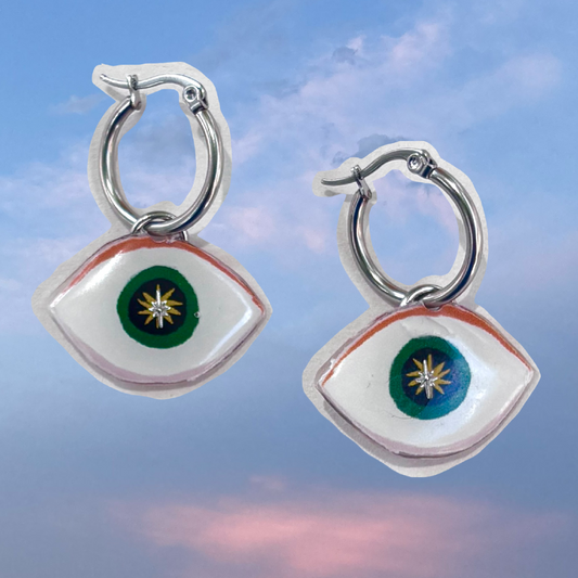 Par de aretes ojitos mentirosos